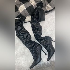 Black thigh high boots